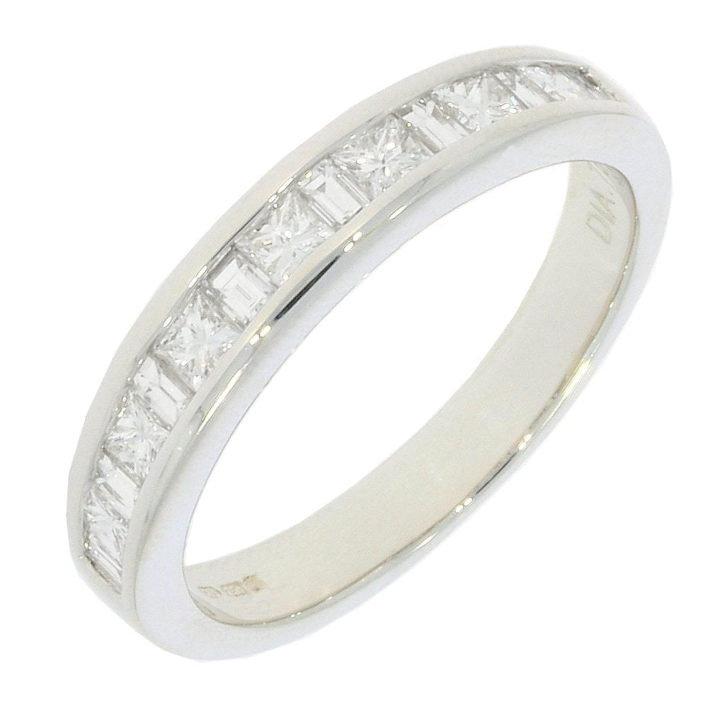 18CT WHITE GOLD EMERALD CUT & BRILLIANT CUT CHANNEL SET DIAMOND BAND WITH 0.75CT DIAMOND