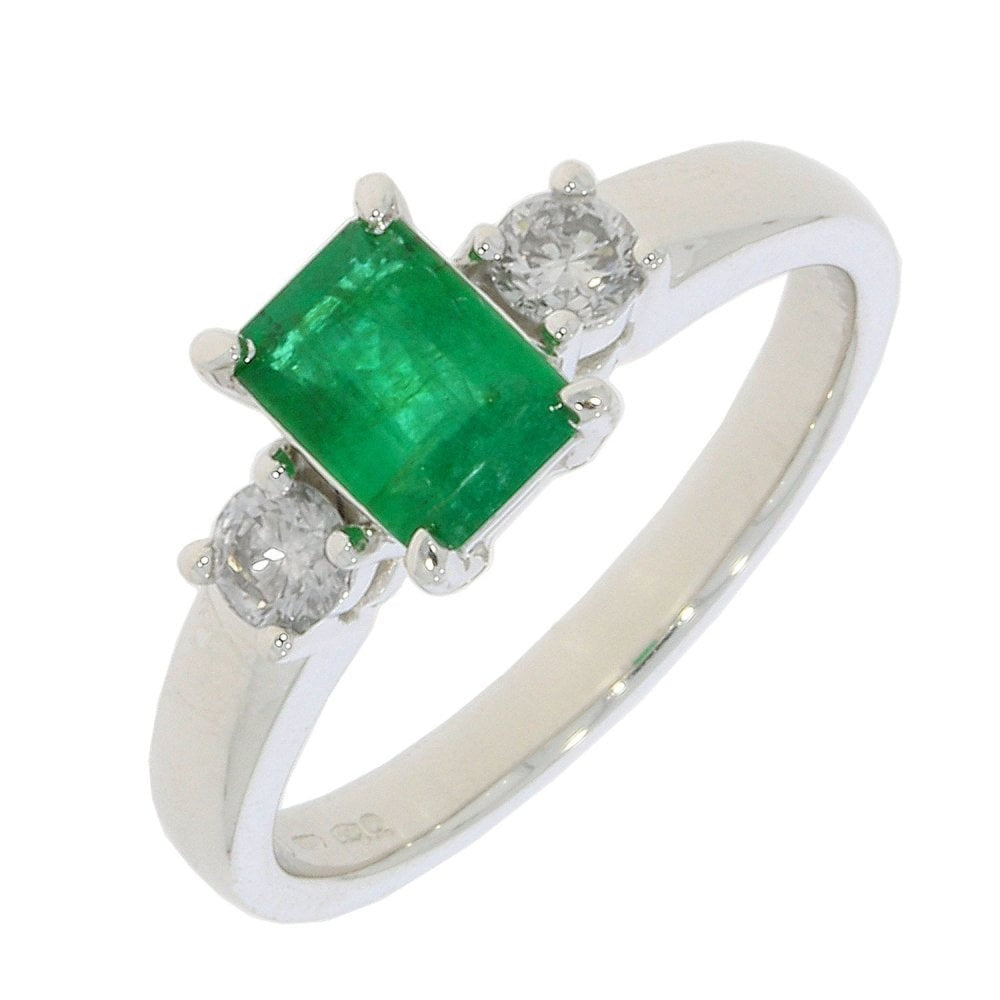 Platinum Emerald cut Emerald with one Diamond on either side (0.25ct Diamond)
