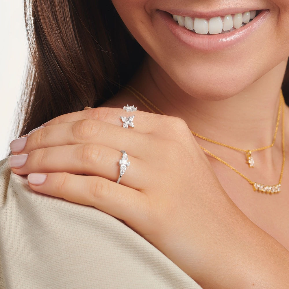 STERLING SILVER ZIRCONIA DANCING STONES RING