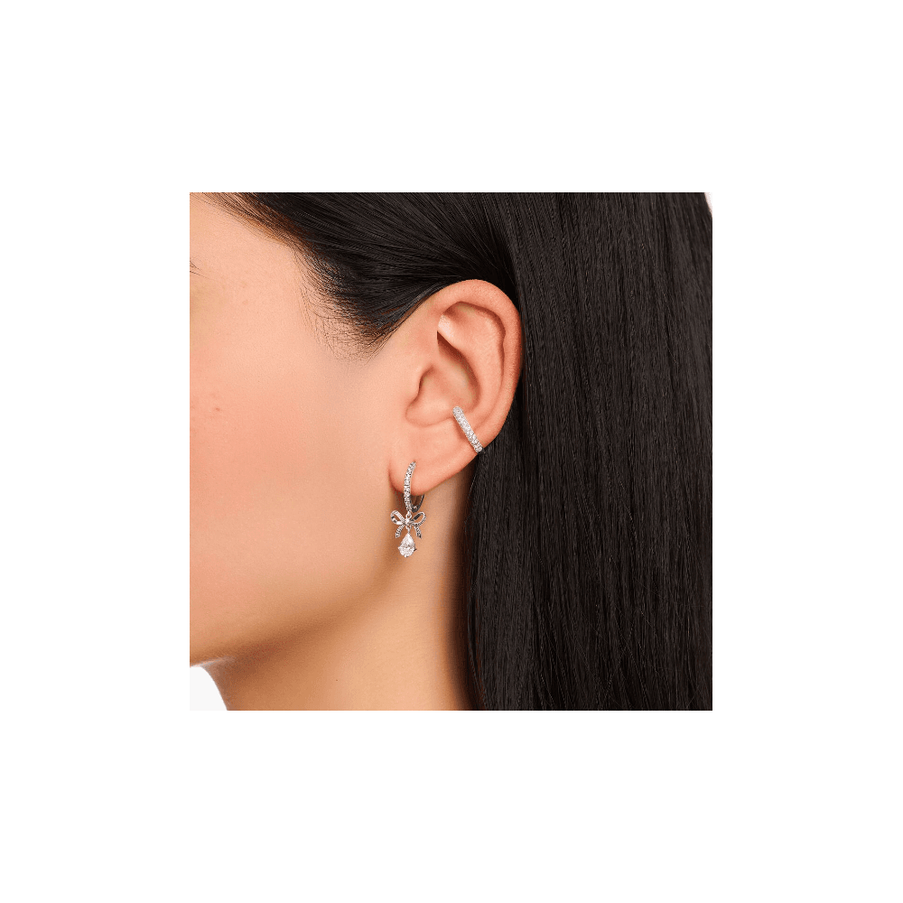 Silver hoop earrings with bow pendant