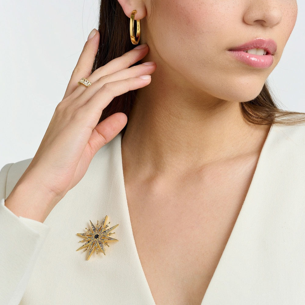 18CT GOLD ON SILVER STAR BROOCH WITH COLOURED STONES