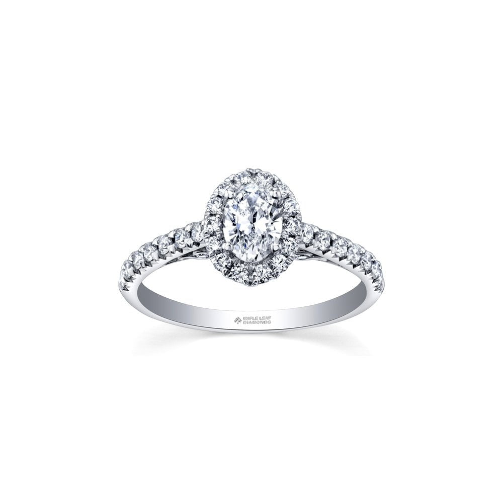 18CT OVAL HALO DIAMOND RING WITH DIAMOND SHOULDER