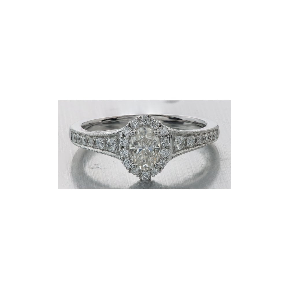 18CT WHITE GOLD OVAL HALO DIAMOND RING WITH DIAMOND SHOULDER