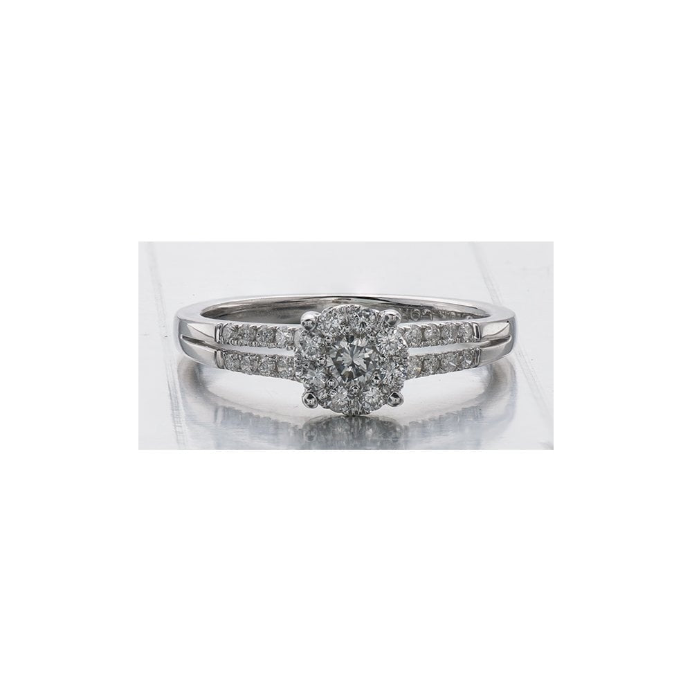 18ct Round Illusion set Solitaire Diamond ring with split Diamond shoulders