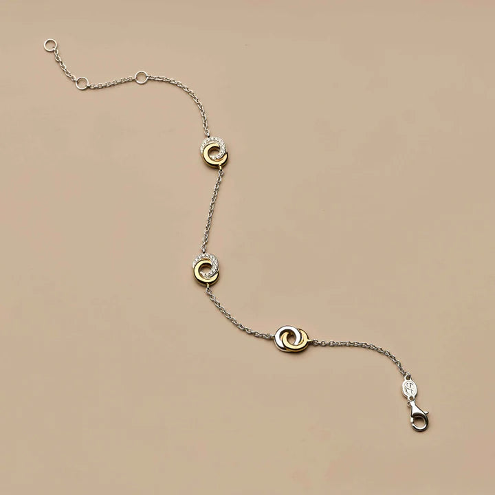 TISENTO CZ TWO-TONED INTERLOCKING RINGS BRACELET