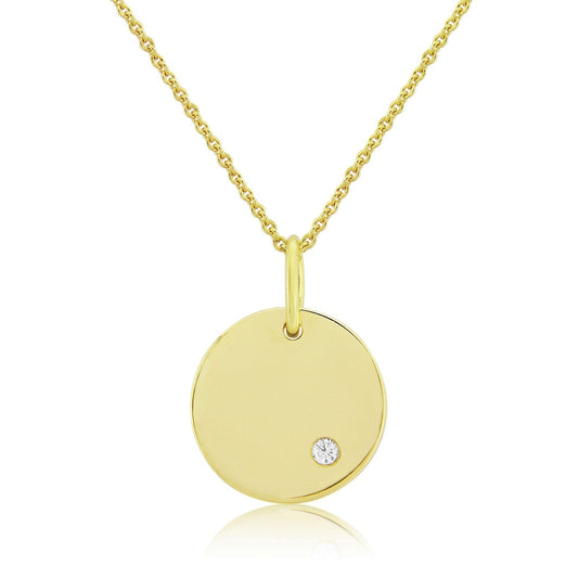 9CT SOLID GOLD DISC WITH ONE DIAMOND DETAIL.