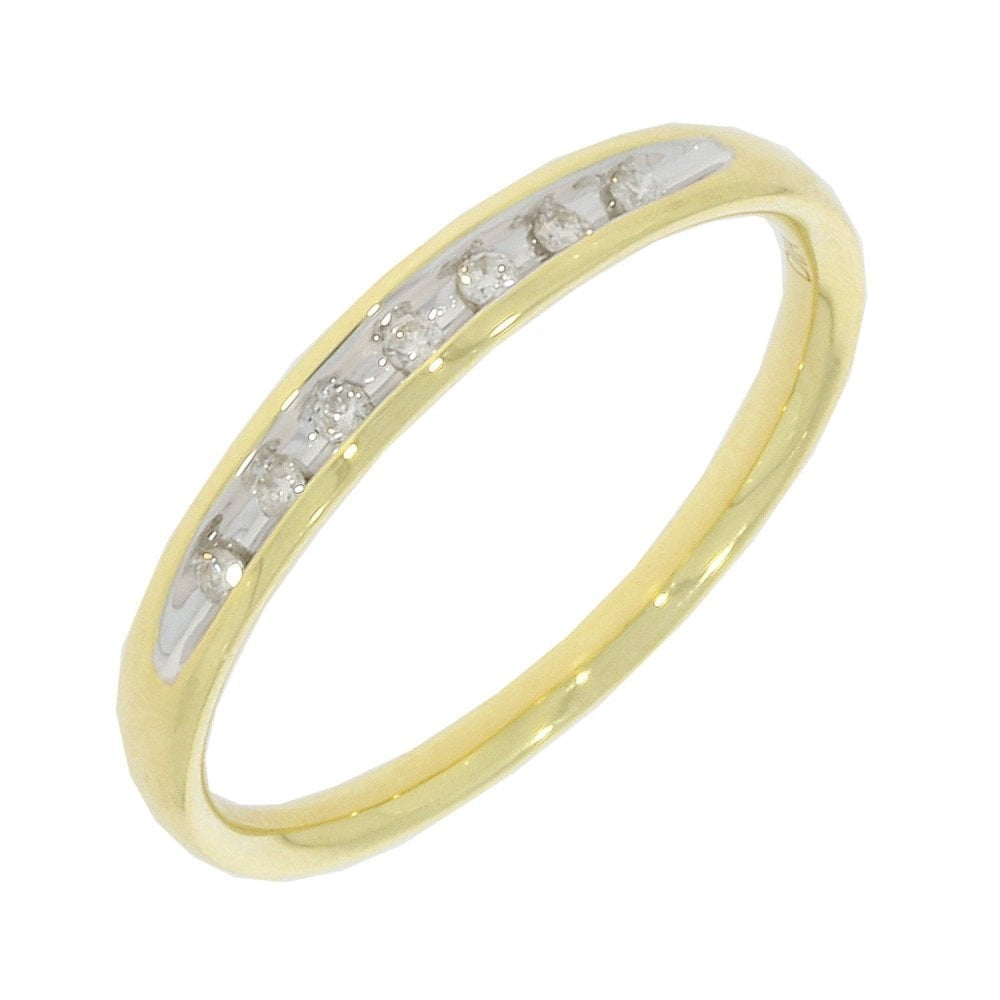 9ct Gold Diamond Ring with 7 Diamonds inset in concave setting