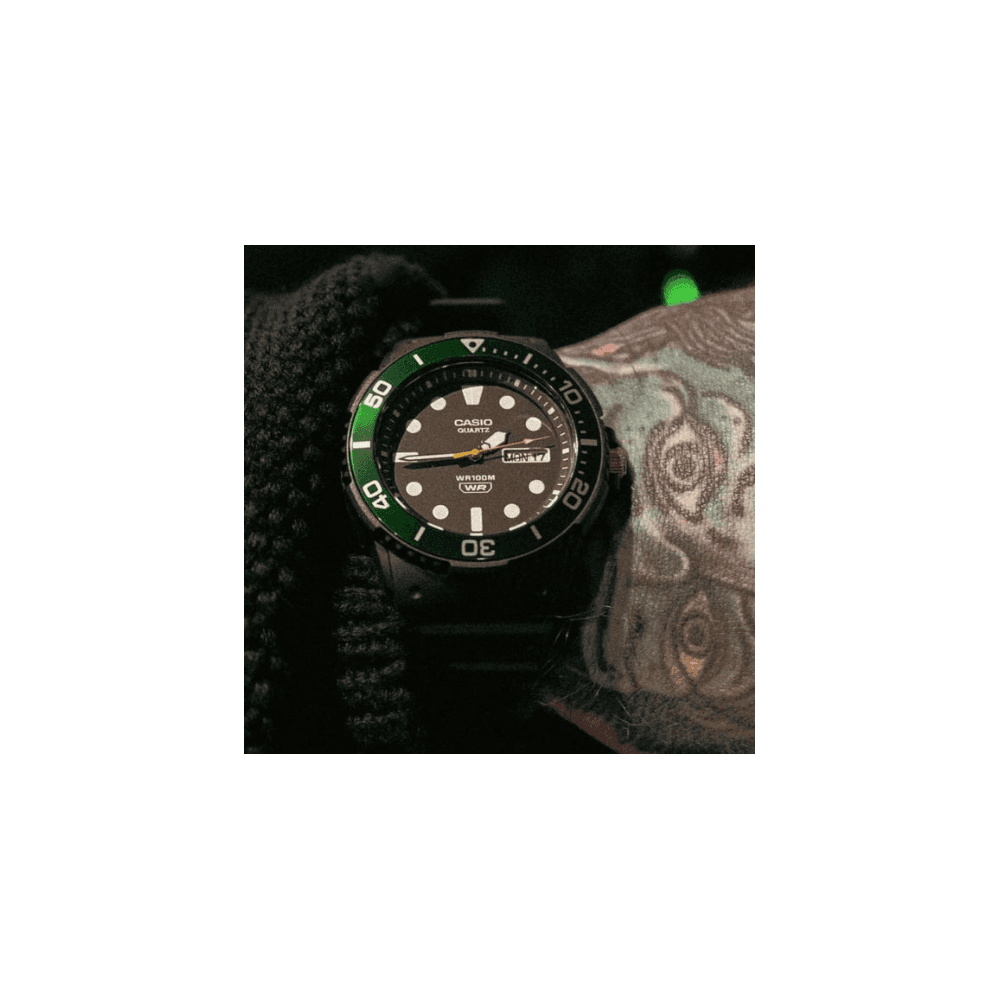 CASIO VINTAGE BLACK DIAL/GREEN BEZEL BLACK RESIN STRAP WATCH