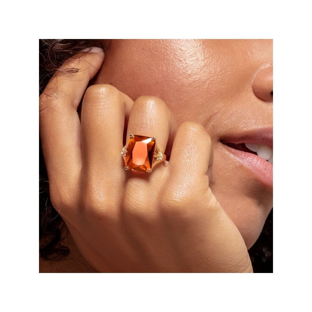 GOLD ON SILVER ORANGE STONE RING WITH CUBIC ZIRCONIA STARS