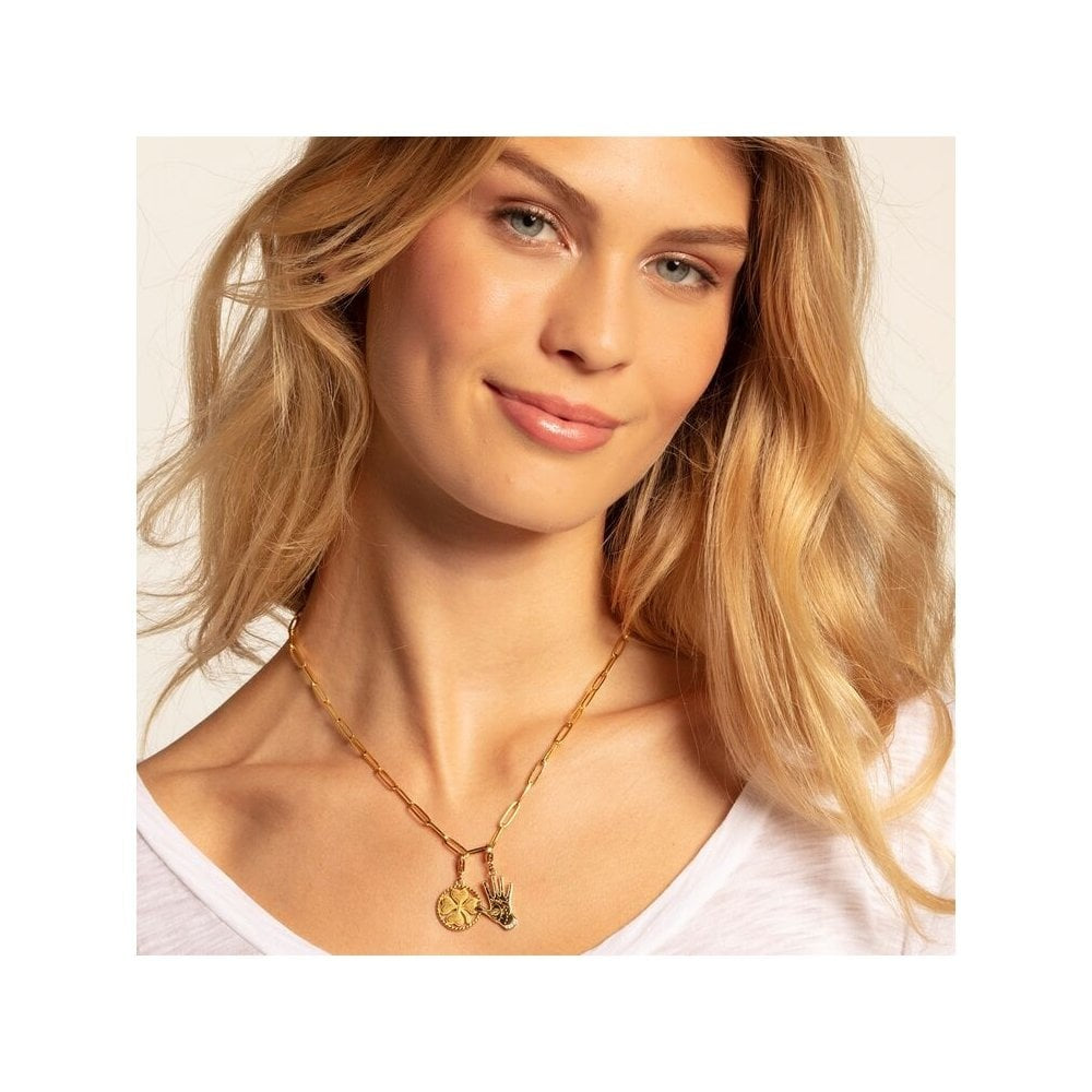 GOLD ON SILVER VINTAGE HAND CHARM PENDANT WITH LIFE & EARTH ENGRAVED ON IT. ALSO FEATURES A CRESENT, STARS & EVIL EYE & A CUBIC ZIRCONIA CUFF
