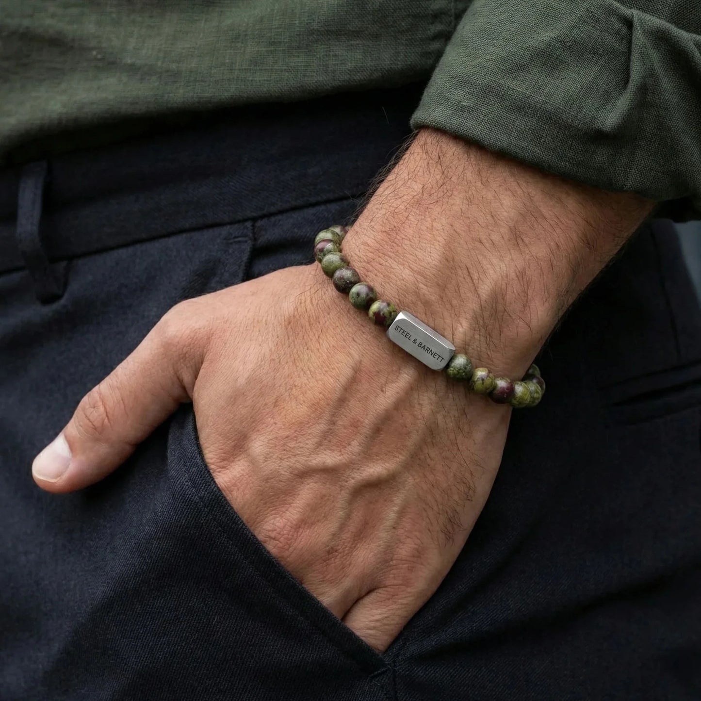 STEEL AND BARNETT NATURAL NED DRAGON BLOOD ROUND GEMSTONE BRACELET