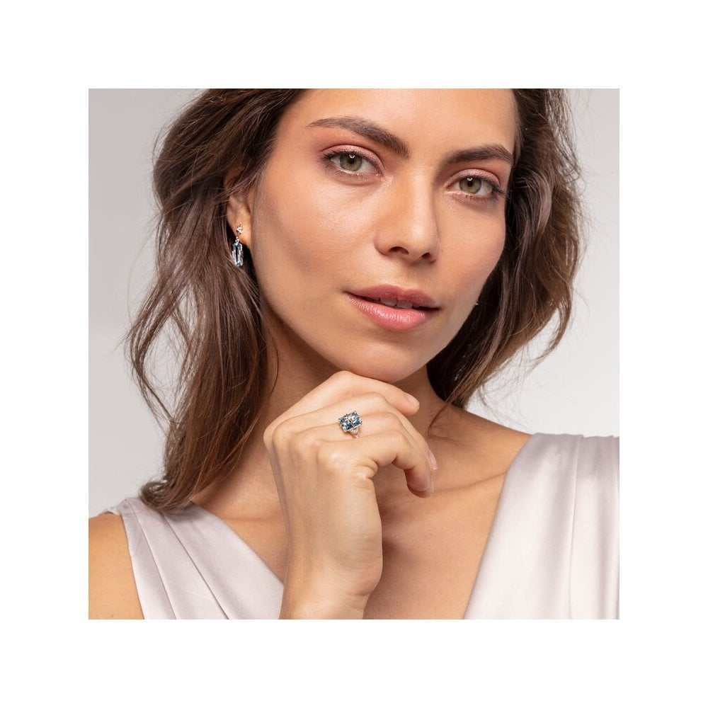 STERLING SILVER AQUAMARINE BLUE STONE RING WITH A SILVER CZ STAR ON IT & A CRESCENT & STAR ON EITHER SIDE OF IT