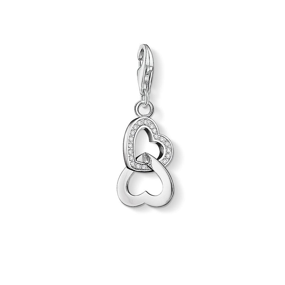 STERLING SILVER INTERLOCKING HEARTS CHARM WITH ONE CUBIC ZIRCONIA HEART AND THE OTHER PLAIN.