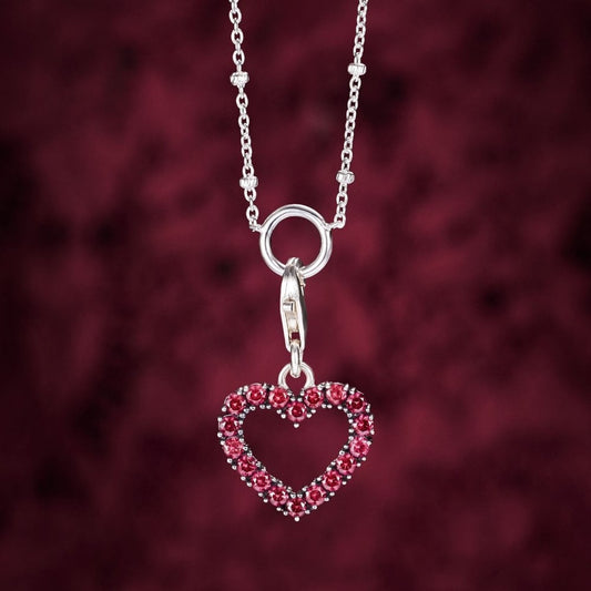 STERLING SILVER OPEN HEART CHARM WITH HOT PINK STONES