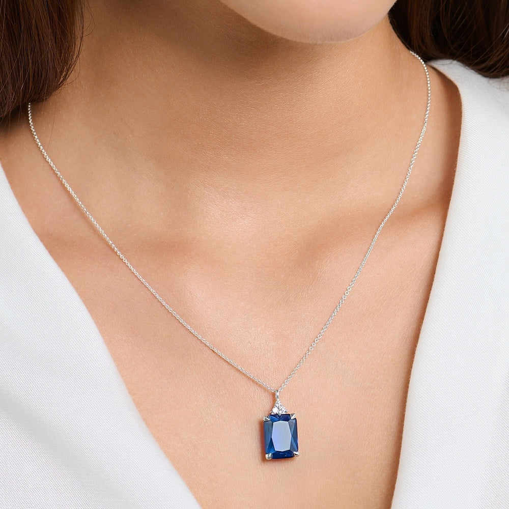 STERLING SILVER RECTANGULAR SAPPHIRE BLUE PENDANT WITH ZIRCONIA DETAIL