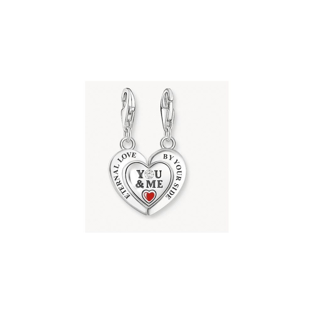 Silver charm pendant in heart-shape with engraving