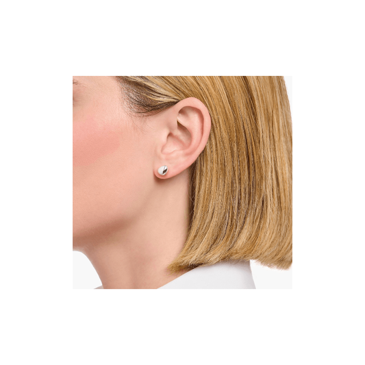 Silver ear studs in organic shape