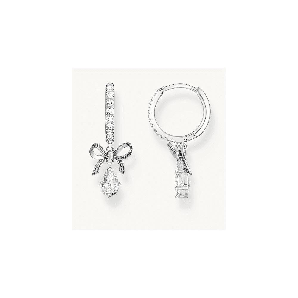 Silver hoop earrings with bow pendant