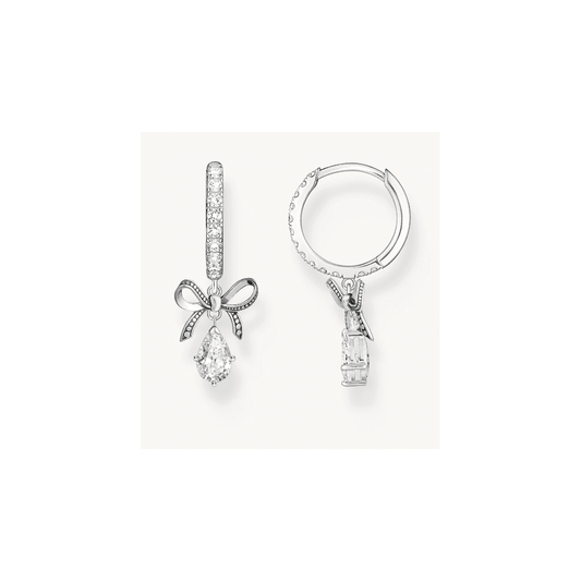 Silver hoop earrings with bow pendant