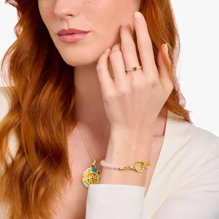 THOMAS SABO GOLD ON SILVER SOLITAIRE RING WITH RED HEART-SHAPED STONE