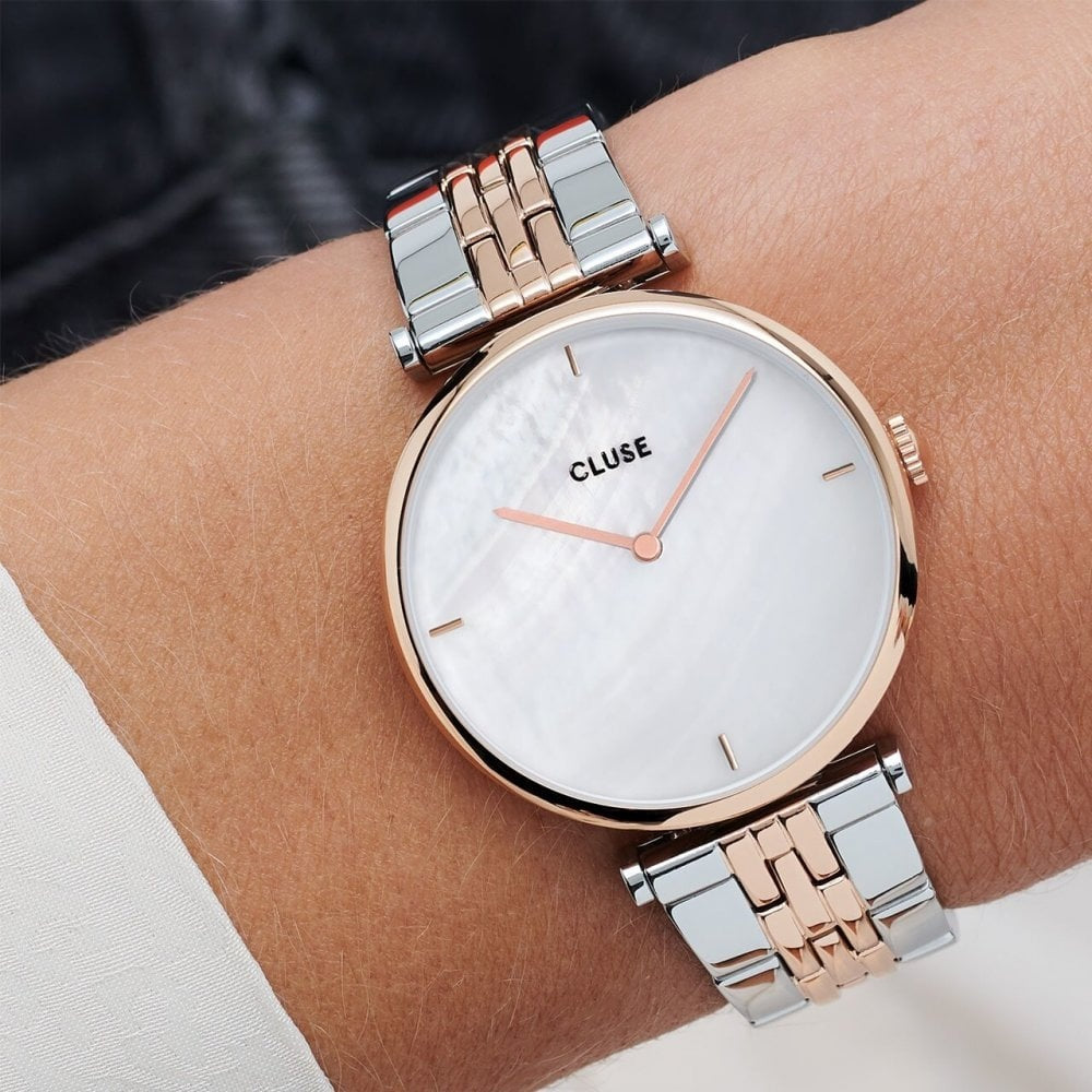 TRIOMPHE LADIES 2 TONE ROSE GOLD STAINLESS STEEL T BAR BRACELET WATCH WITH WHITE PEARLY DIAL